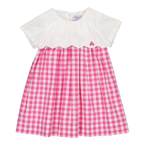 Ashley, two-tone dress with embroidered and scalopped top in white cotton piqué, and bottom in Large fuchsia gingham