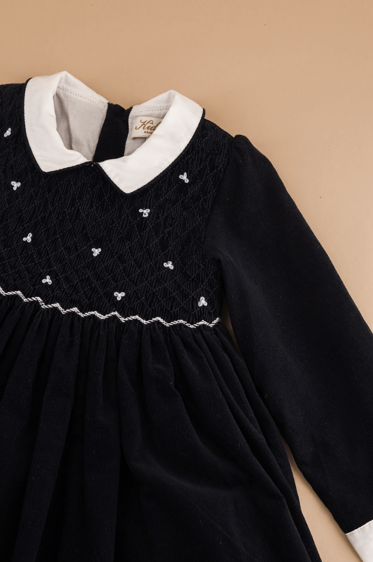 Coline, robe à smocks en velours côtelé marine