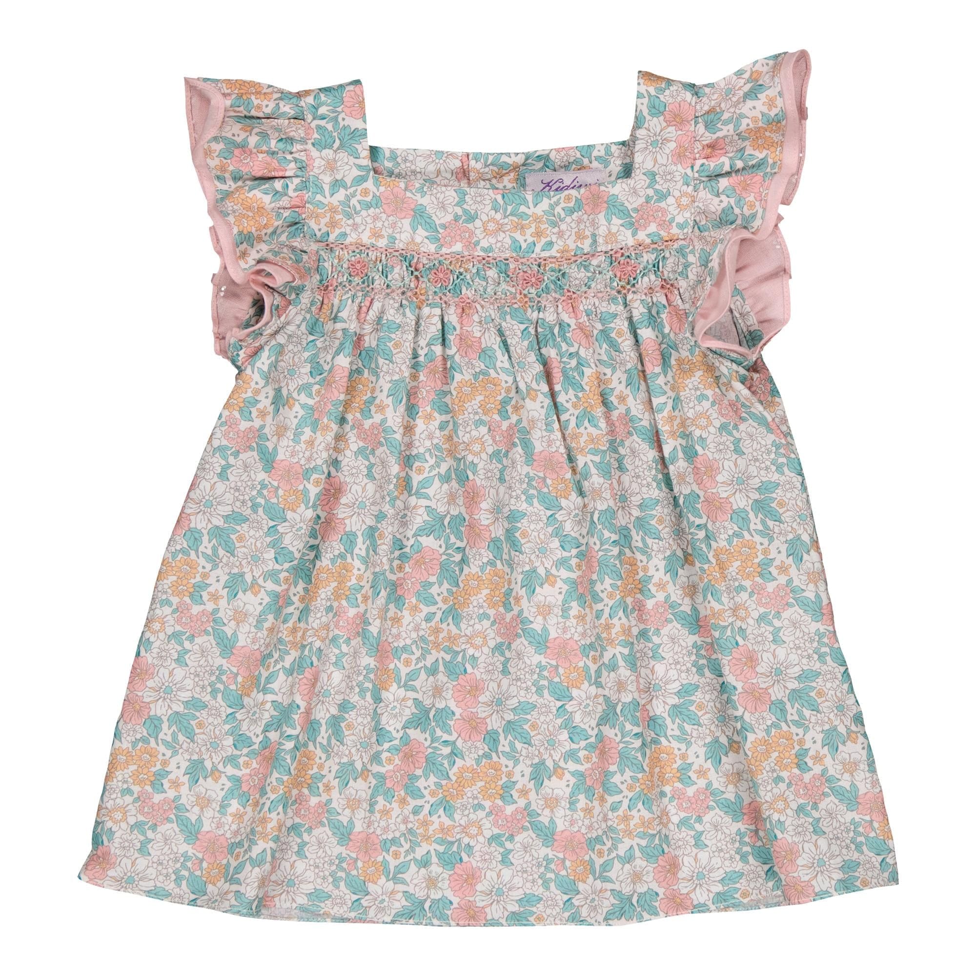 Dianella, blouse fille smockée à manches volantées et encolure carrée, en imprimé floral corail et menthe