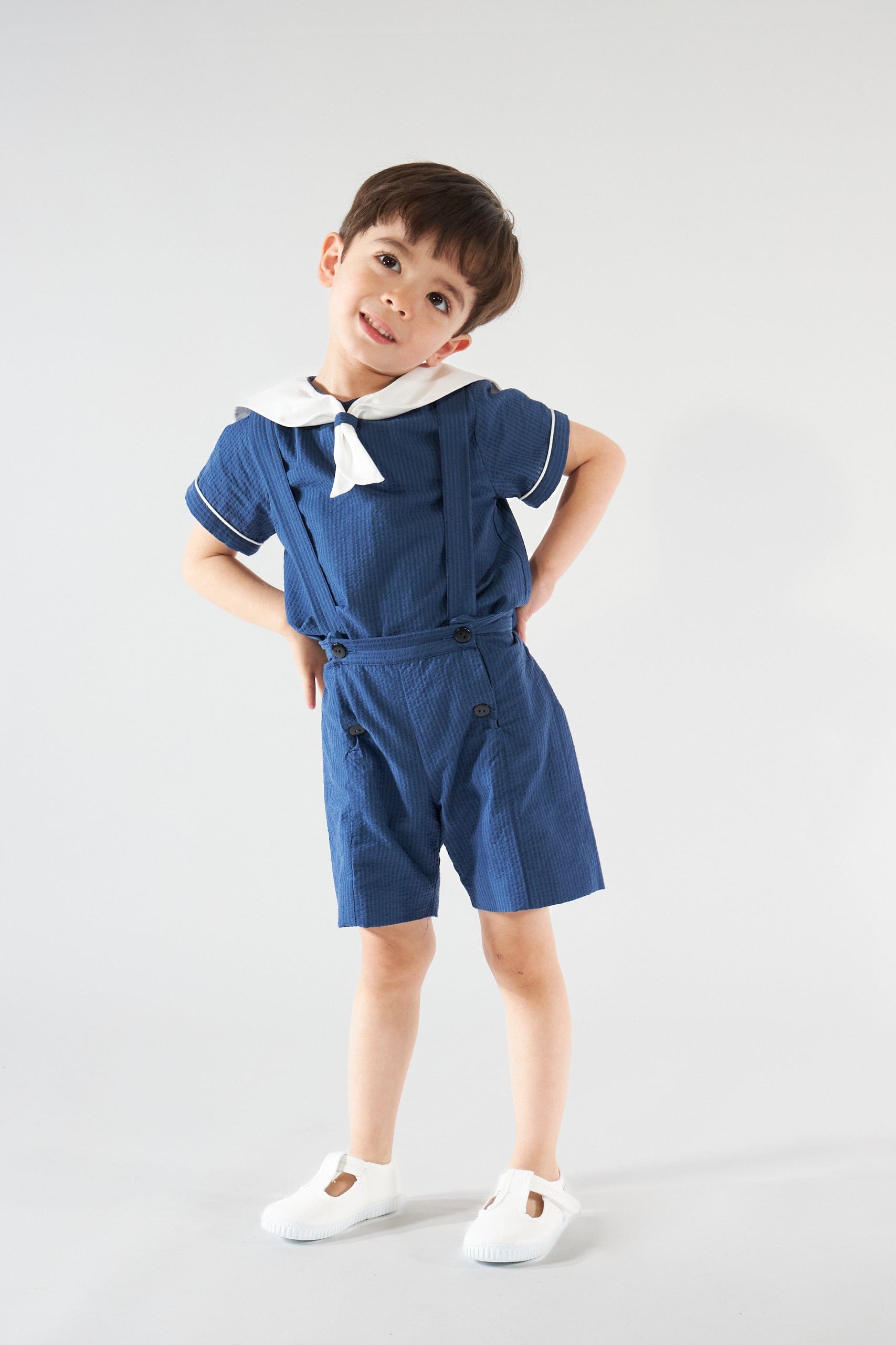 Eustache, blouse garçon, en petites rayures seersucker bleu marine