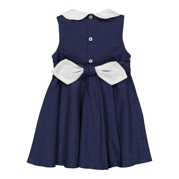 Fantine, smocked dress with white scalopped collar, bias cut skirt, in Jean chambray