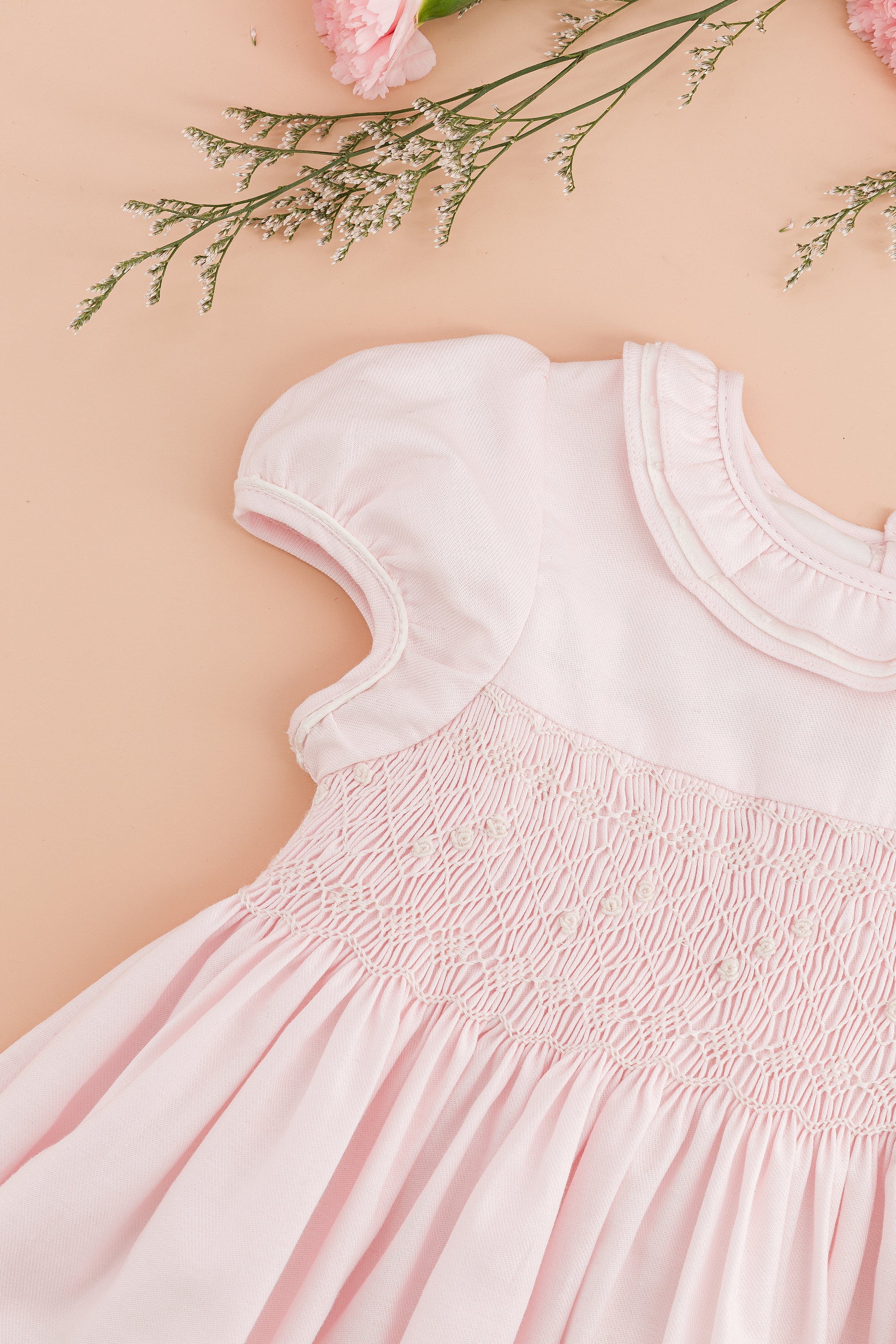 Hars, robe smockée en twill de coton rose pâle