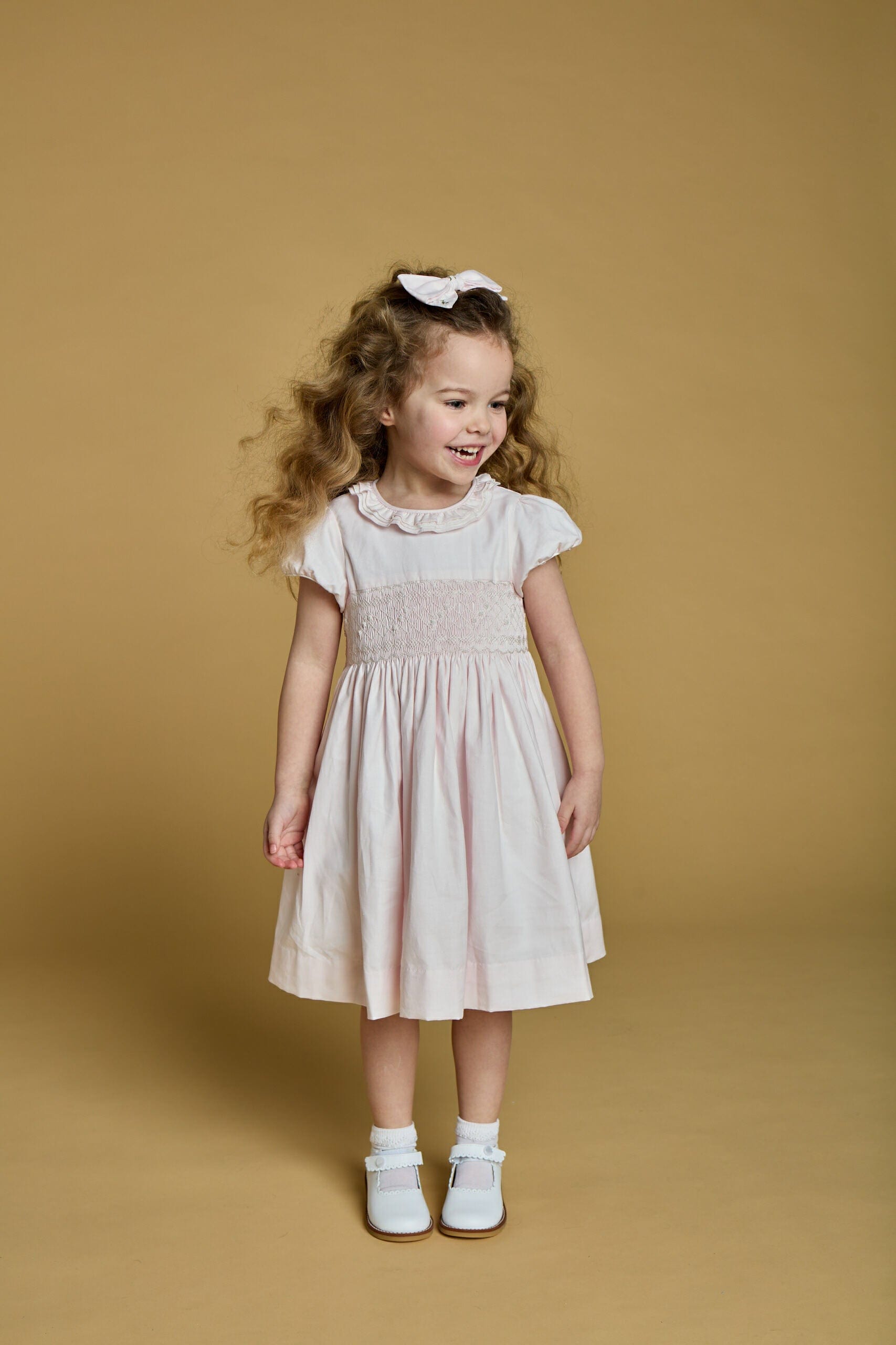 Hars, robe smockée en twill de coton rose pâle