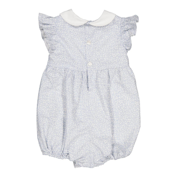 Julyne , smocked baby girl romper with ruffled sleeves and white Peter Pan collar, in Small sky blue print