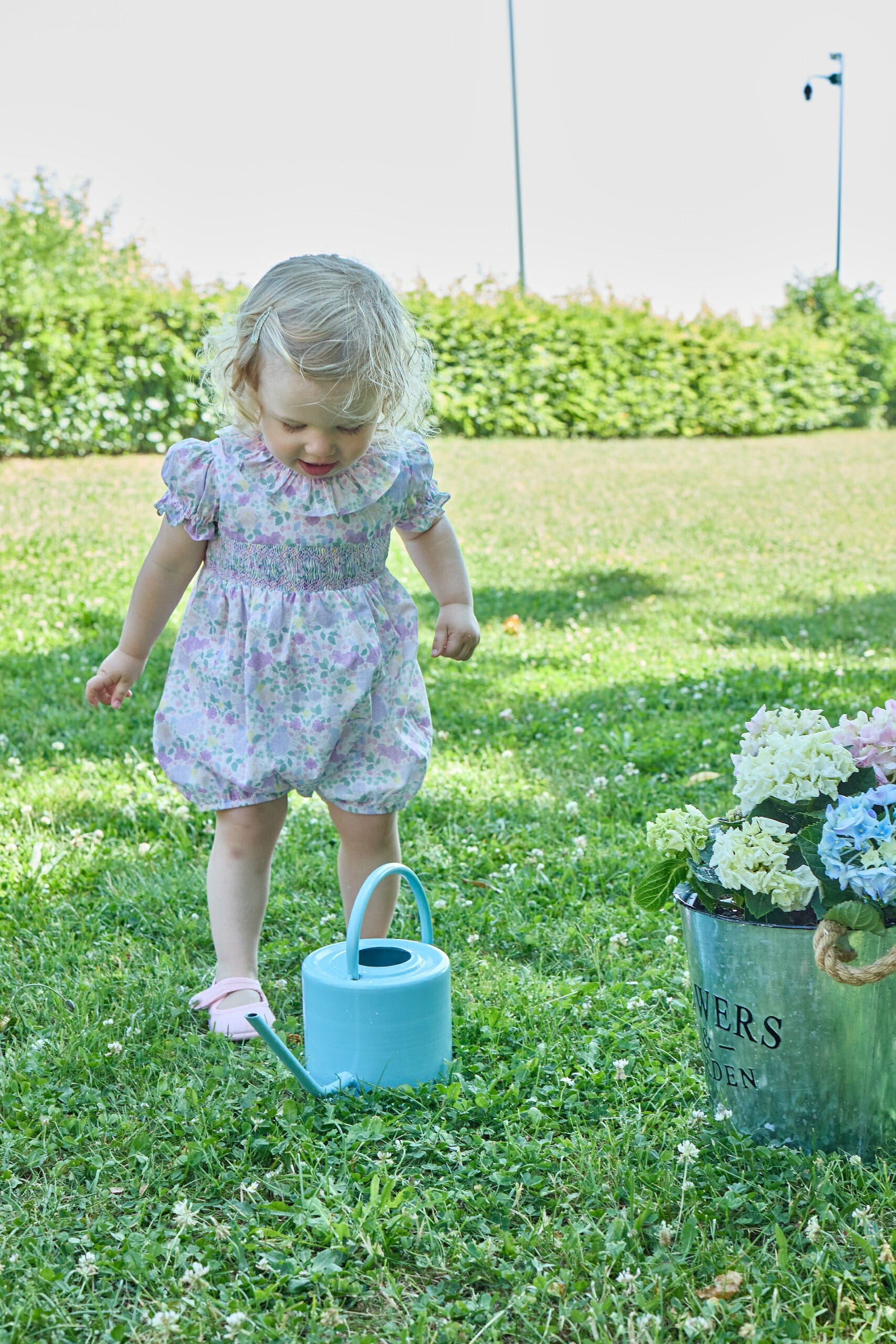 Anthéa MC, smocked girl romper, in  Exclusive Lilac and pink garden print