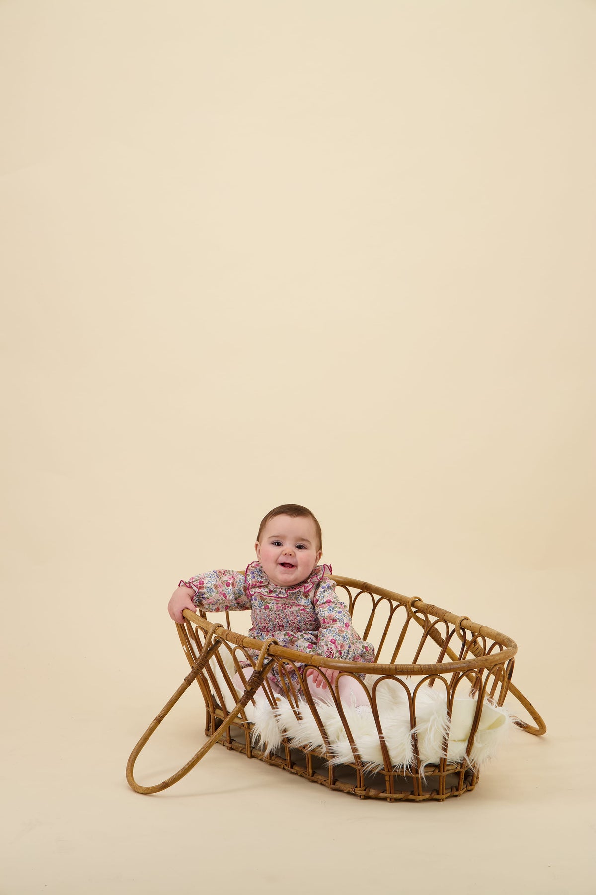 Anthéa, smocked girl romper, in Pink and raspberry floral print