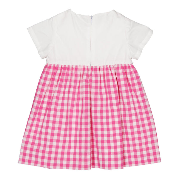 Ashley, two-tone dress with embroidered and scalopped top in white cotton piqué, and bottom in Large fuchsia gingham