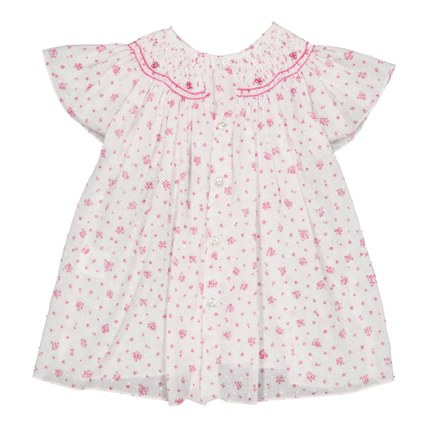 Bergénie, girl blouse with butterfly sleeves, smocked neckline, in White plumetis printed with small fuchsia flowers