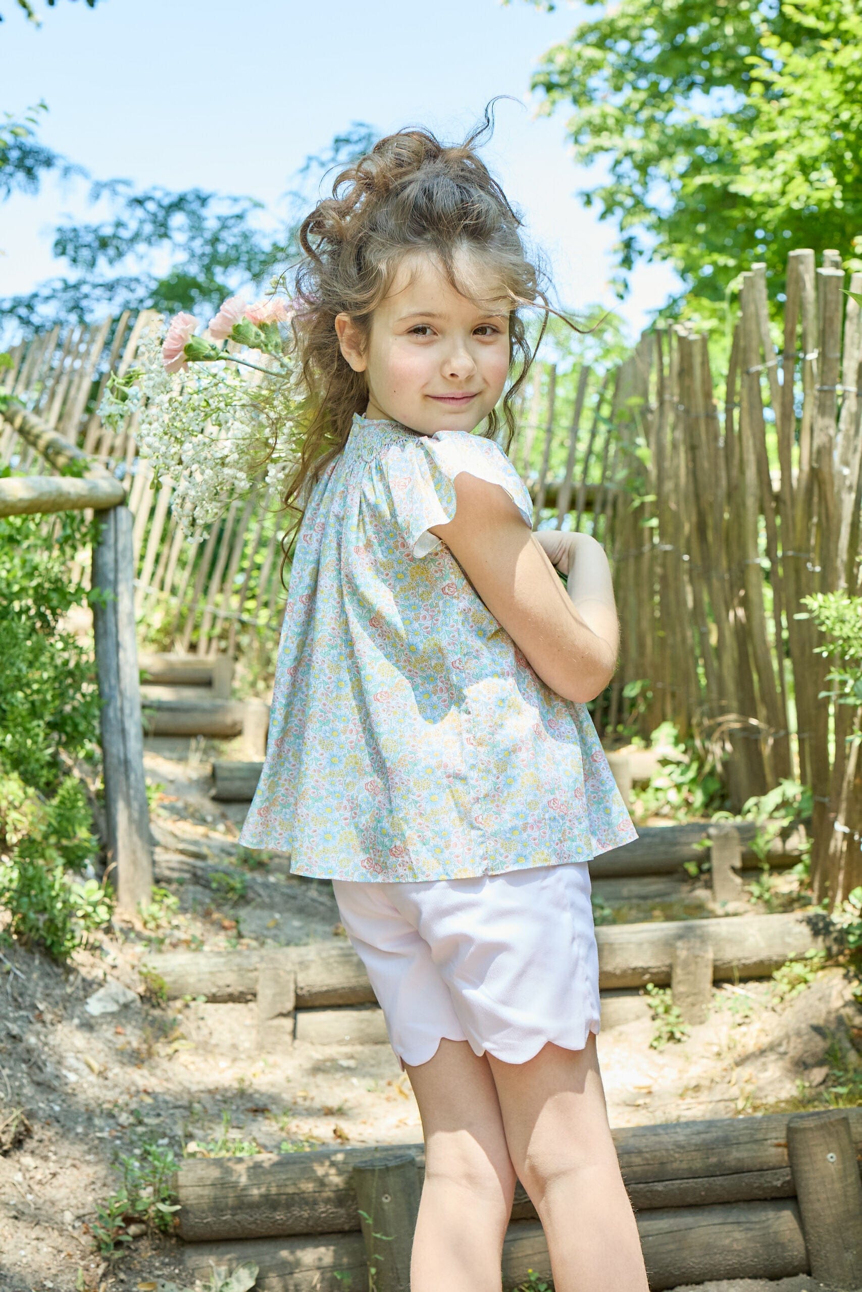 Bergénie, smocked girl blouse, in  Coral yellow floral print