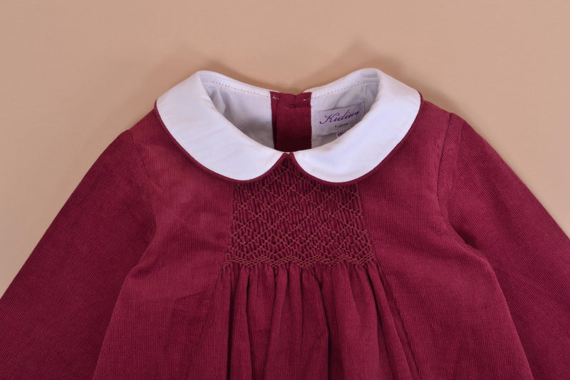 Caleb, Long-sleeved baby romper, Peter Pan collar, smocked in front, in Bordeaux corduroy