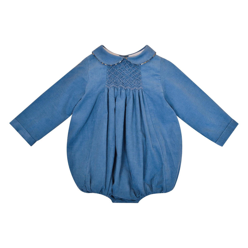 Caleb, Long-sleeved baby romper, Peter Pan collar with Liberty trim, smocked in front, in Blue porcelaine corduroy