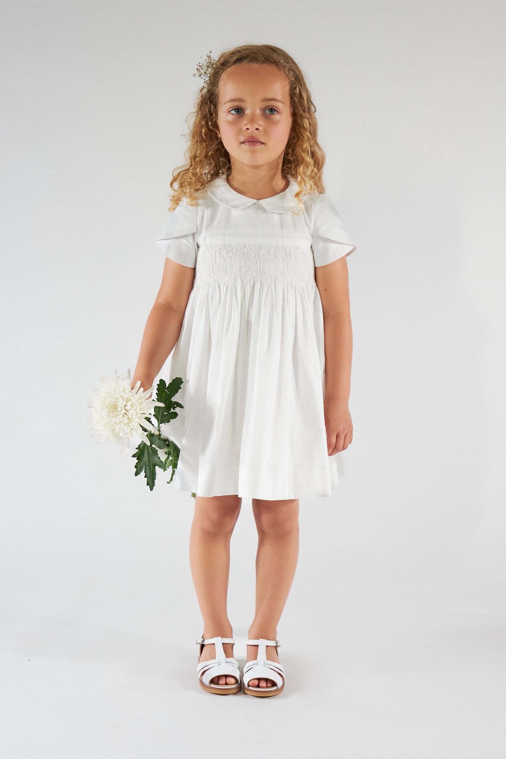 Clémence, robe smockée, en  piqué de coton blanc
