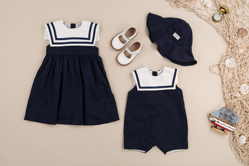 Constantina, dress with white sailor collar decorated with two rows of navy ribbon, in Navy cotton piqué