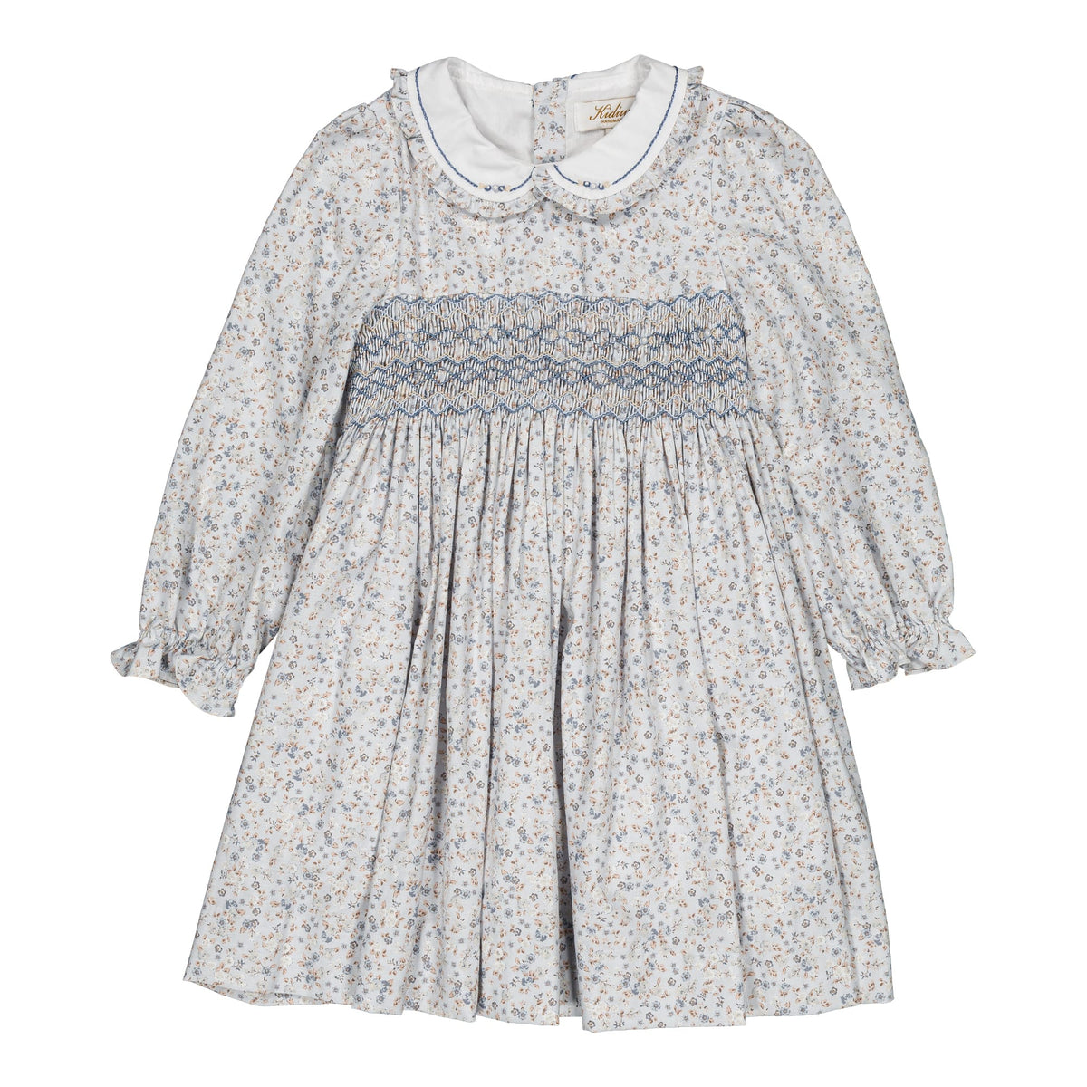 Héloïse, Robe smockée pour fille, motif petites fleurs bleues