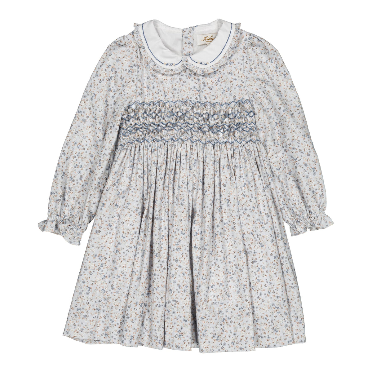 Héloïse, Robe smockée pour fille, motif petites fleurs bleues