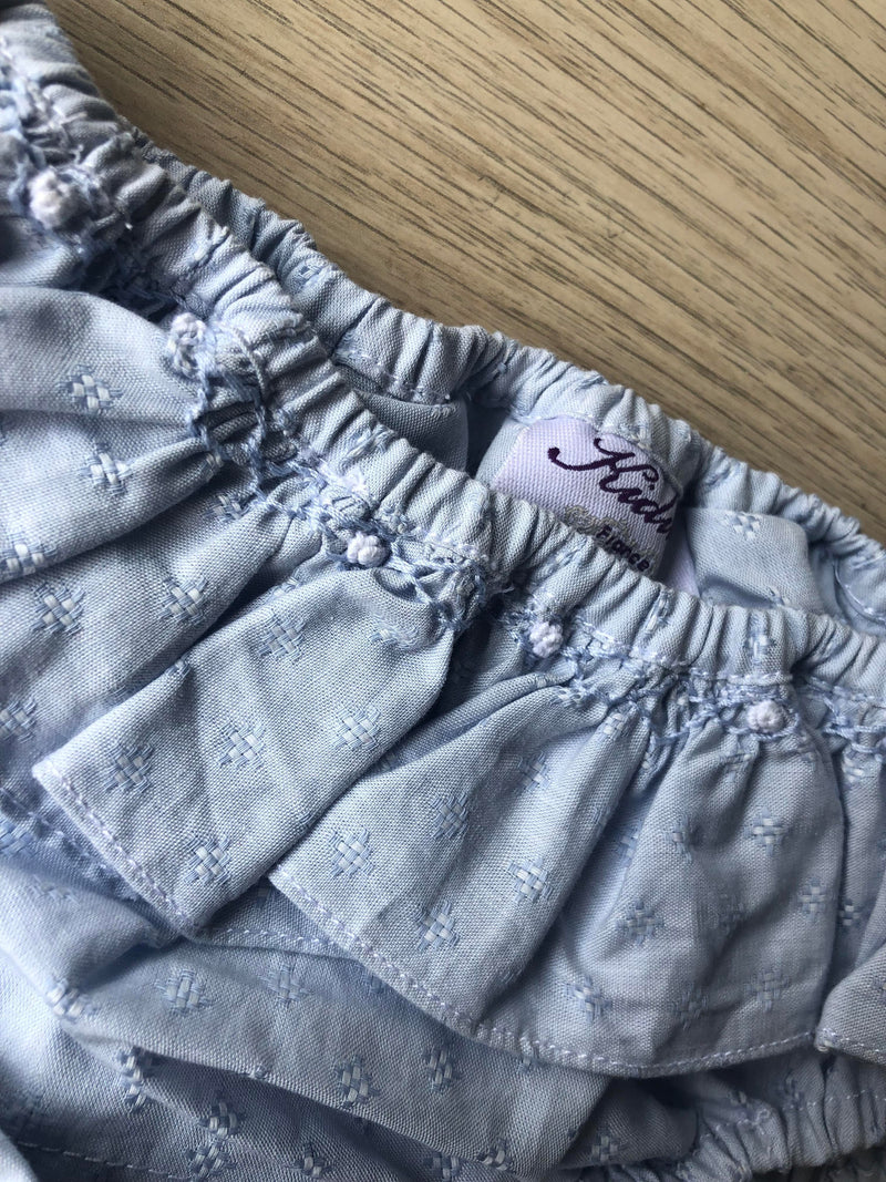 Hibiscus, culotte de bain bleue