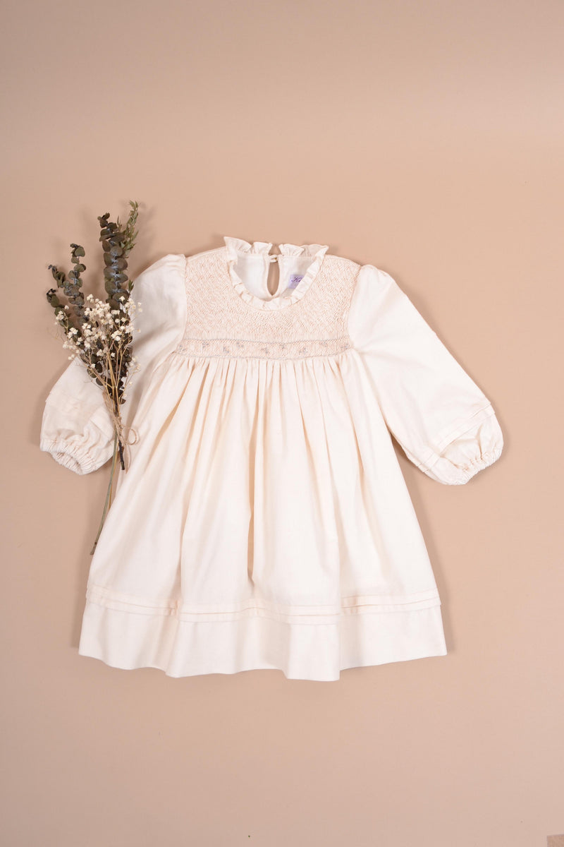 Léonie, Long-sleeved dress with pintucks, high ruffled collar, smocked top, in Ecru corduroy