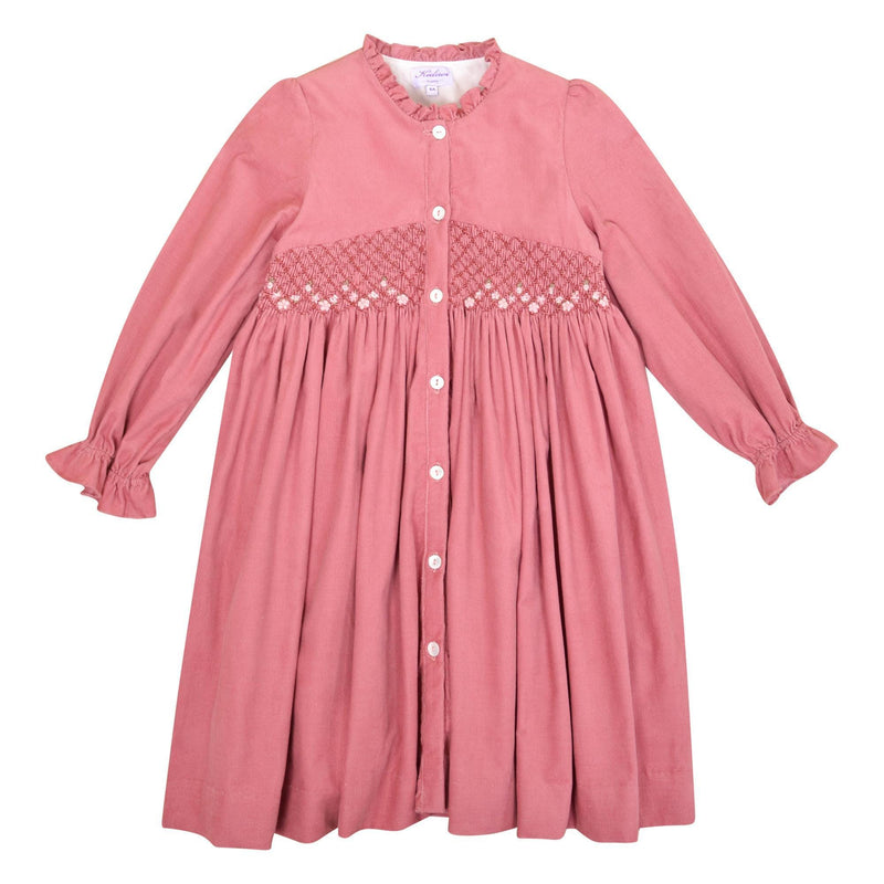 Lola, Robe à manches longues, col haut à volants, ouverture devant et smockée à la taille, en velours côtelé rose Marsala - Lola, Dress with long sleeves, high ruffled collar, front opening and smocked at the waist, in Marsala rose corduroy