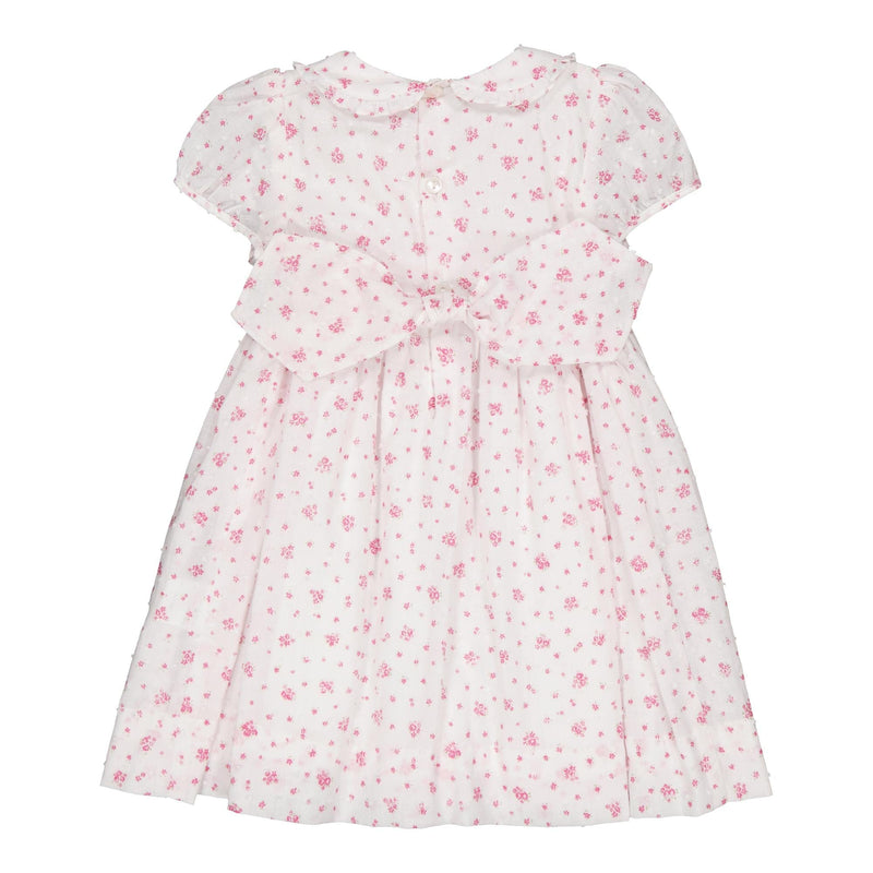 Lorraine, smocked dress with puffed-sleeved, ruffled peter pan collars, in White plumetis printed with small fuchsia flowers