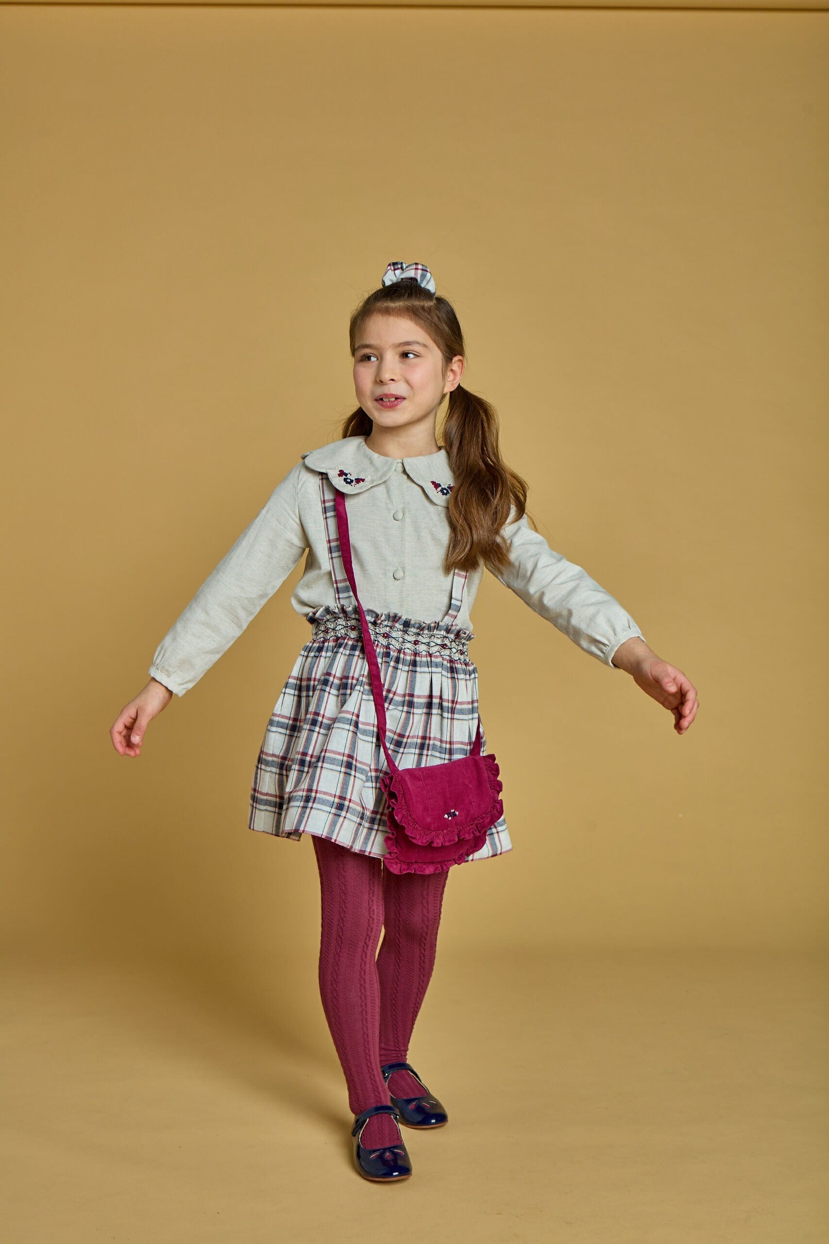 Louise, jupe smockée en tartan marine/bordeaux