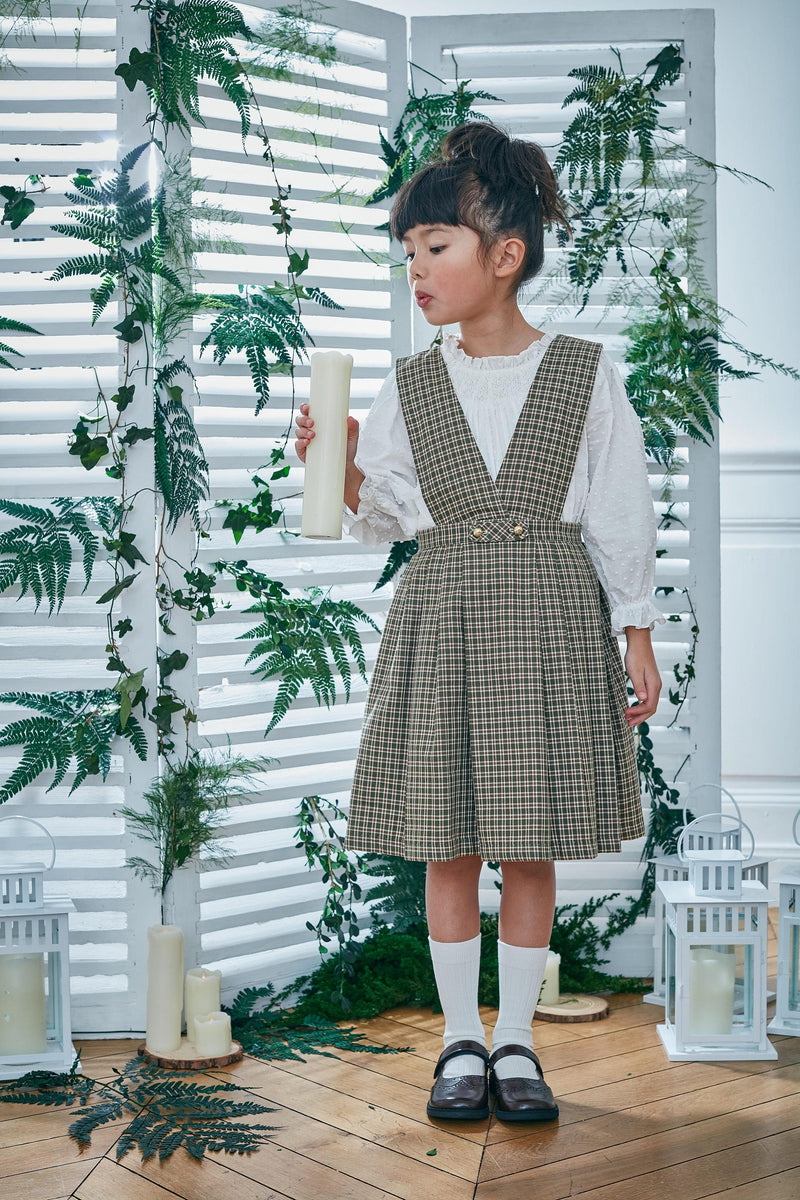 Maëline, Girl's blouse with long raglan sleeves, high ruffled collar and fully smocked neckline, in Off white plumetis