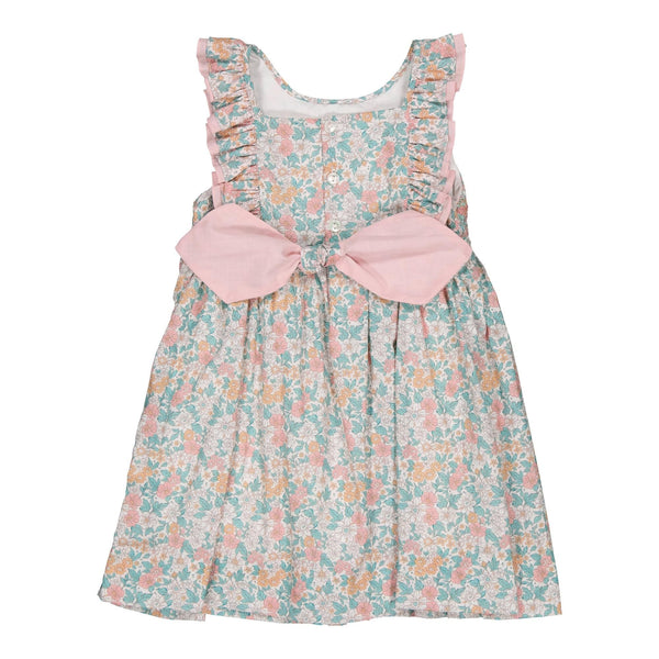 Mélina, smocked dress with two rows of ruffles at the neckline and back, in Coral and mint floral print