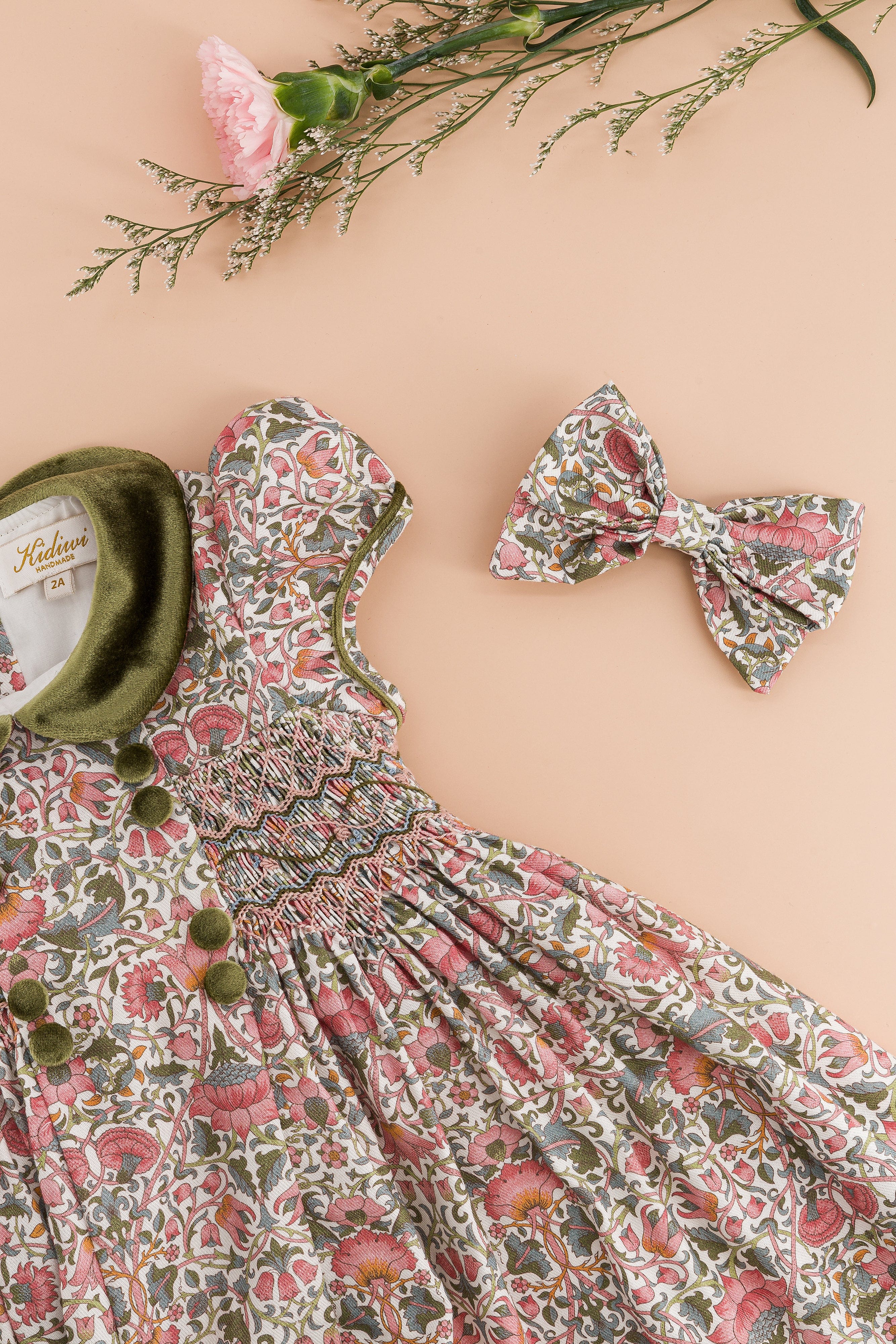 Rison, robe smockée imprimé baroque rose