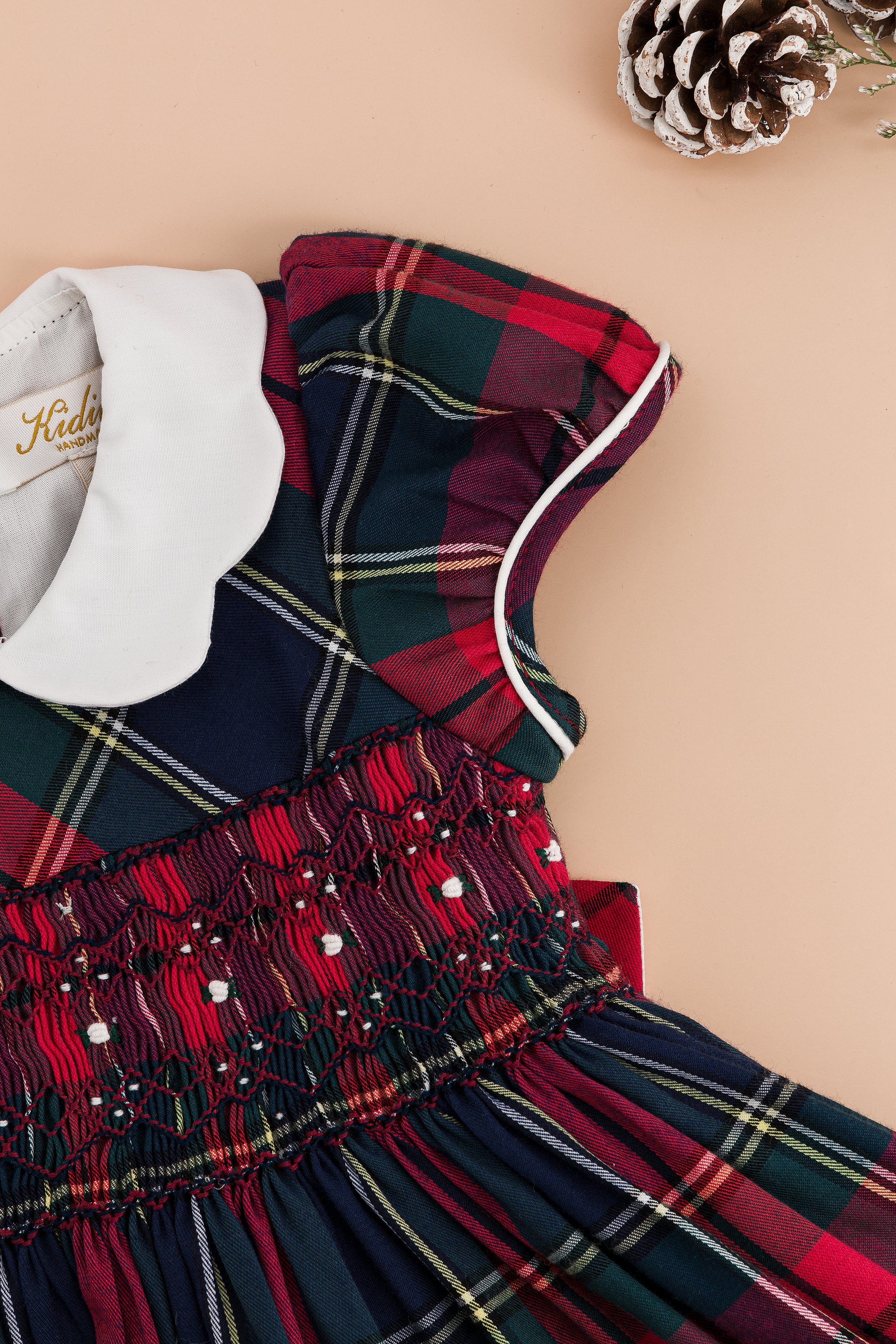 Ritha, robe smockée, en tartan bleu marine et rouge