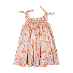 Sarriette,robe à bretelle ajustable noeuds, taille smockée, en Liberty of London "Spring Bloom"-dress with adjustable bow strap, smocked waist, enliberty of London "Spring Bloom"