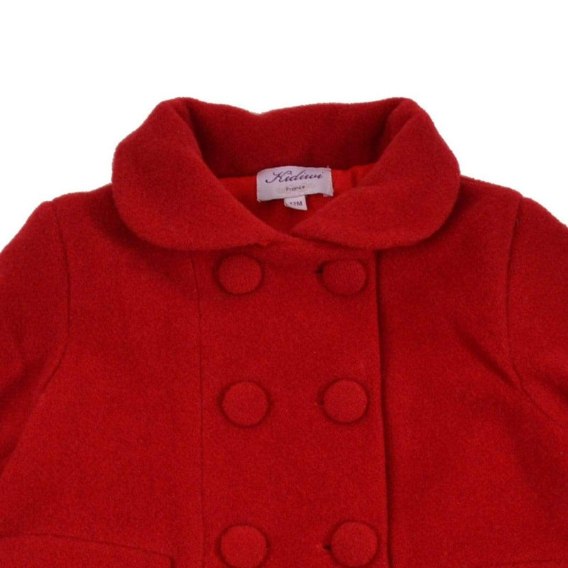 Manteau en laine rouge et détails en velours rouge