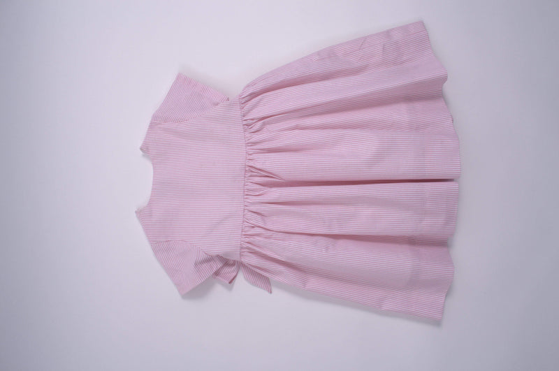 Robe à smocks rayée rose avec un maxi nœud