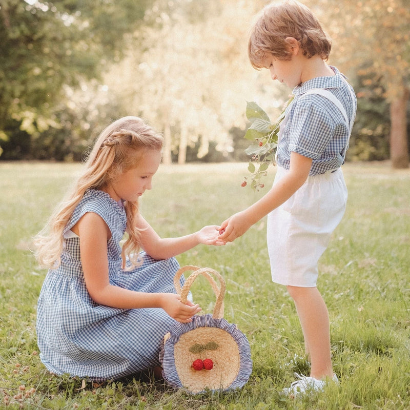 Robe cache cœur en vichy bleu denim, col et buste à volants