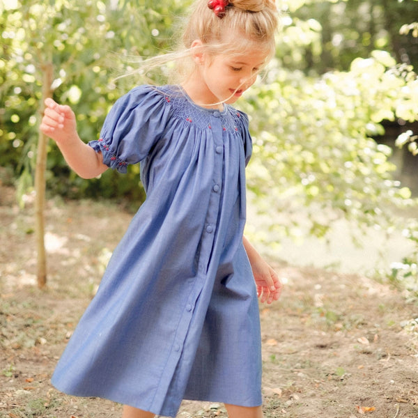 Robe bébé fille bleue imprimée de petites fleurs jaunes et blanches