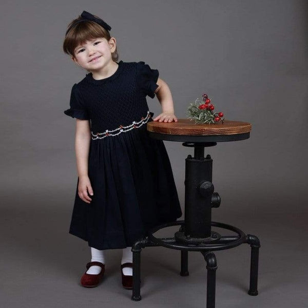 Robe smockée marine avec col volant