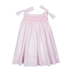 Sarriette, robe à bretelle ajustable noeuds, taille smockée, en plumetis baby rose - dress with adjustable bow straps, smocked waist, in baby pink plumetis