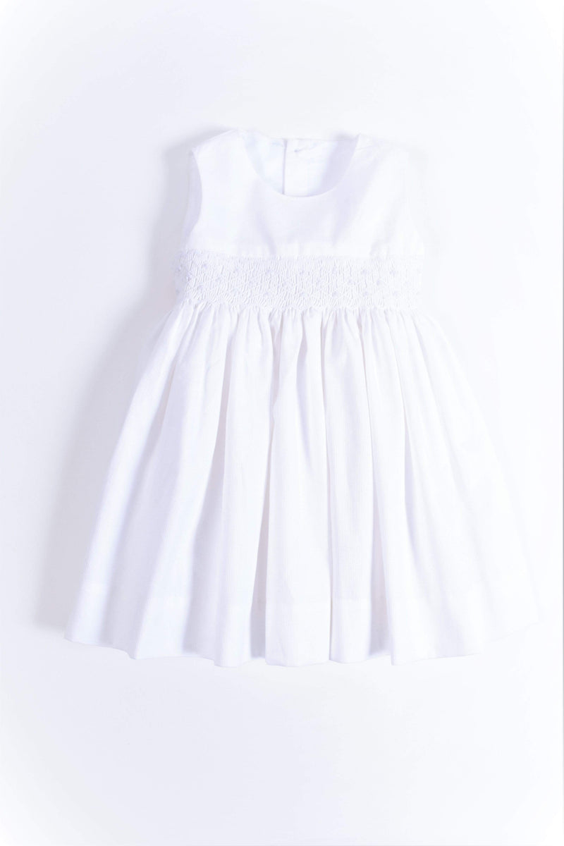 Smocked sleeveless white pique dress